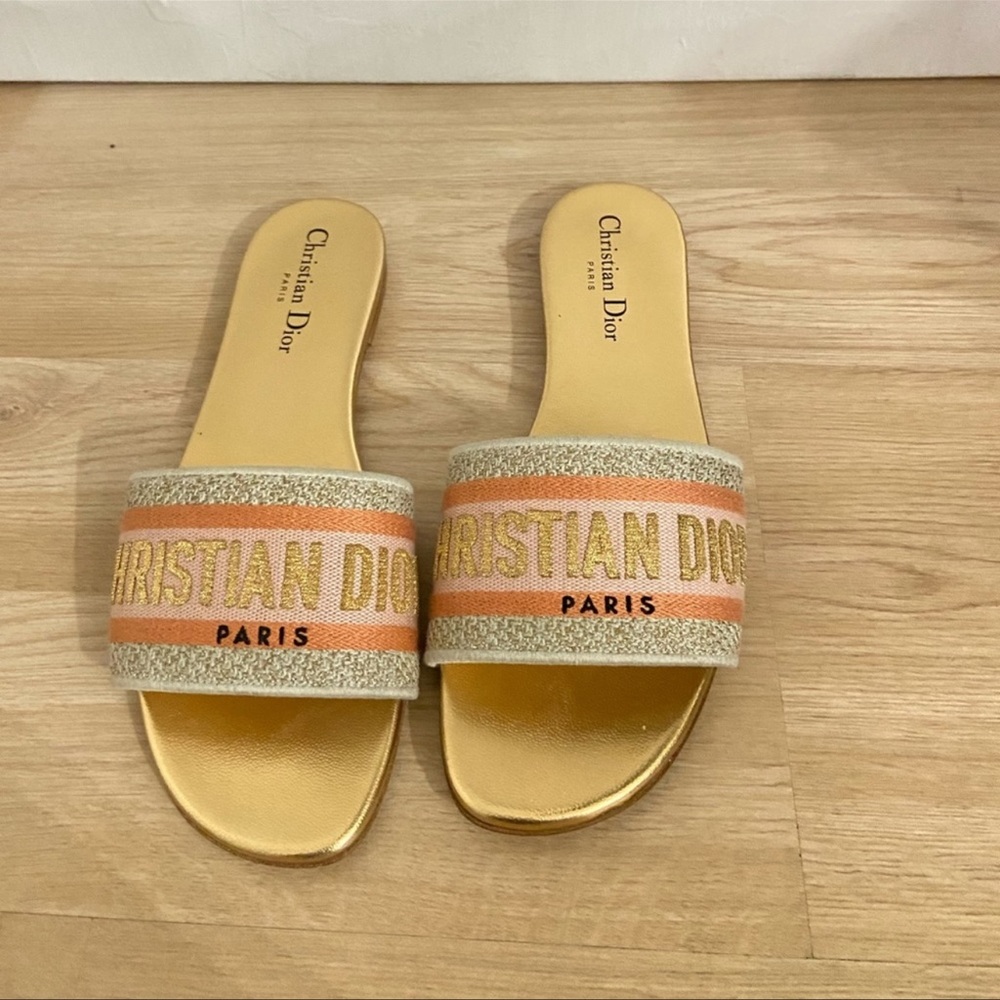Christian Dior Dway Slides in Gold.